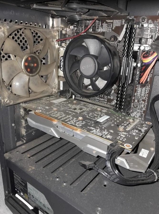 Dusty desktop before computer cleaning Singapore service