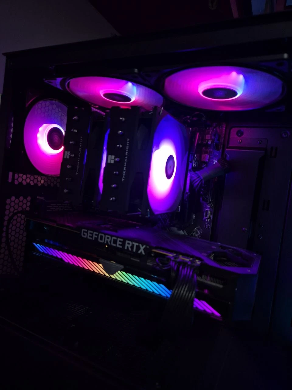 Desktop interior with purple RGB cooling and graphics card